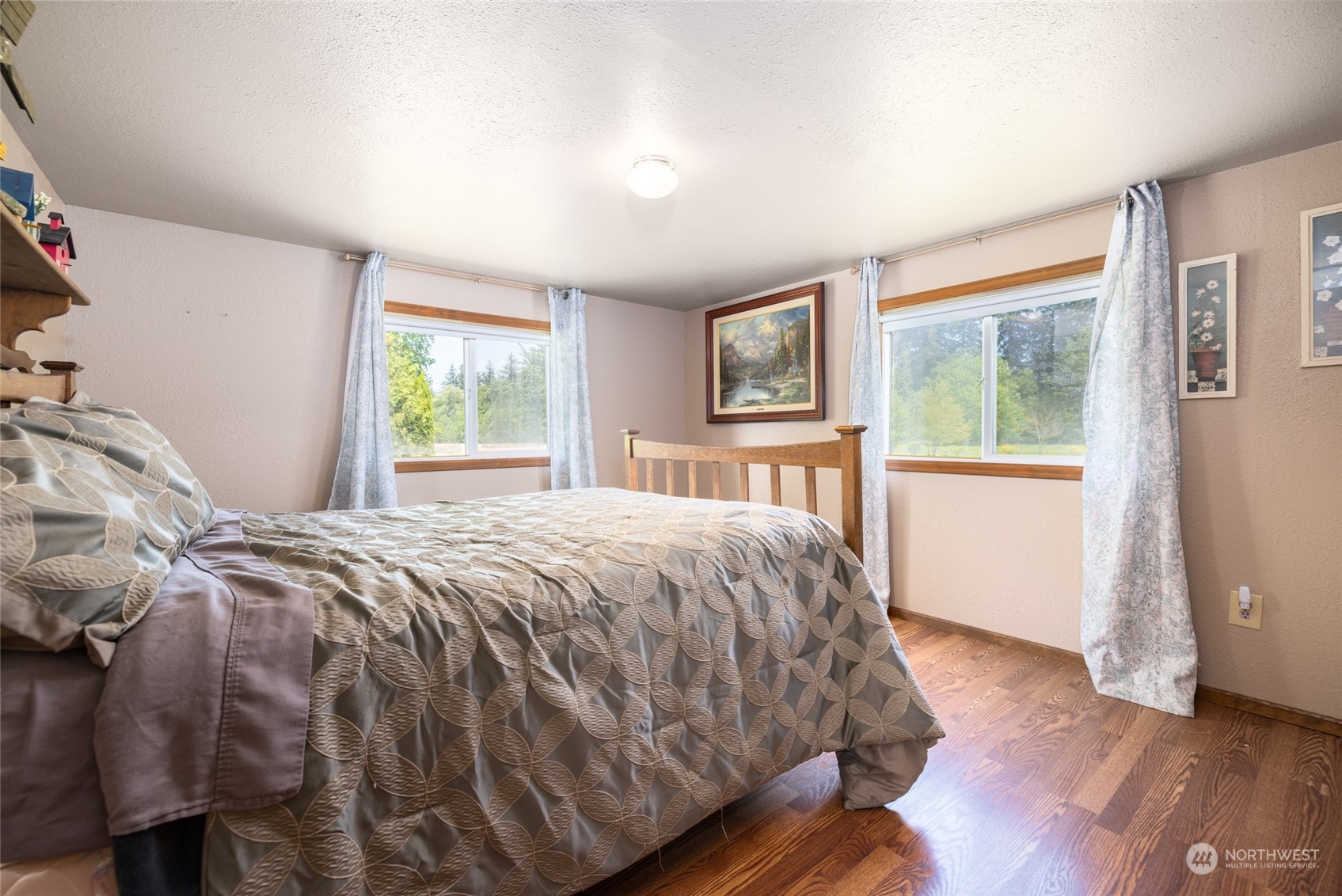 3304 South Pass Road Everson, WA 98247 - Photo 20 of 40 a bedroom with a bed and a window