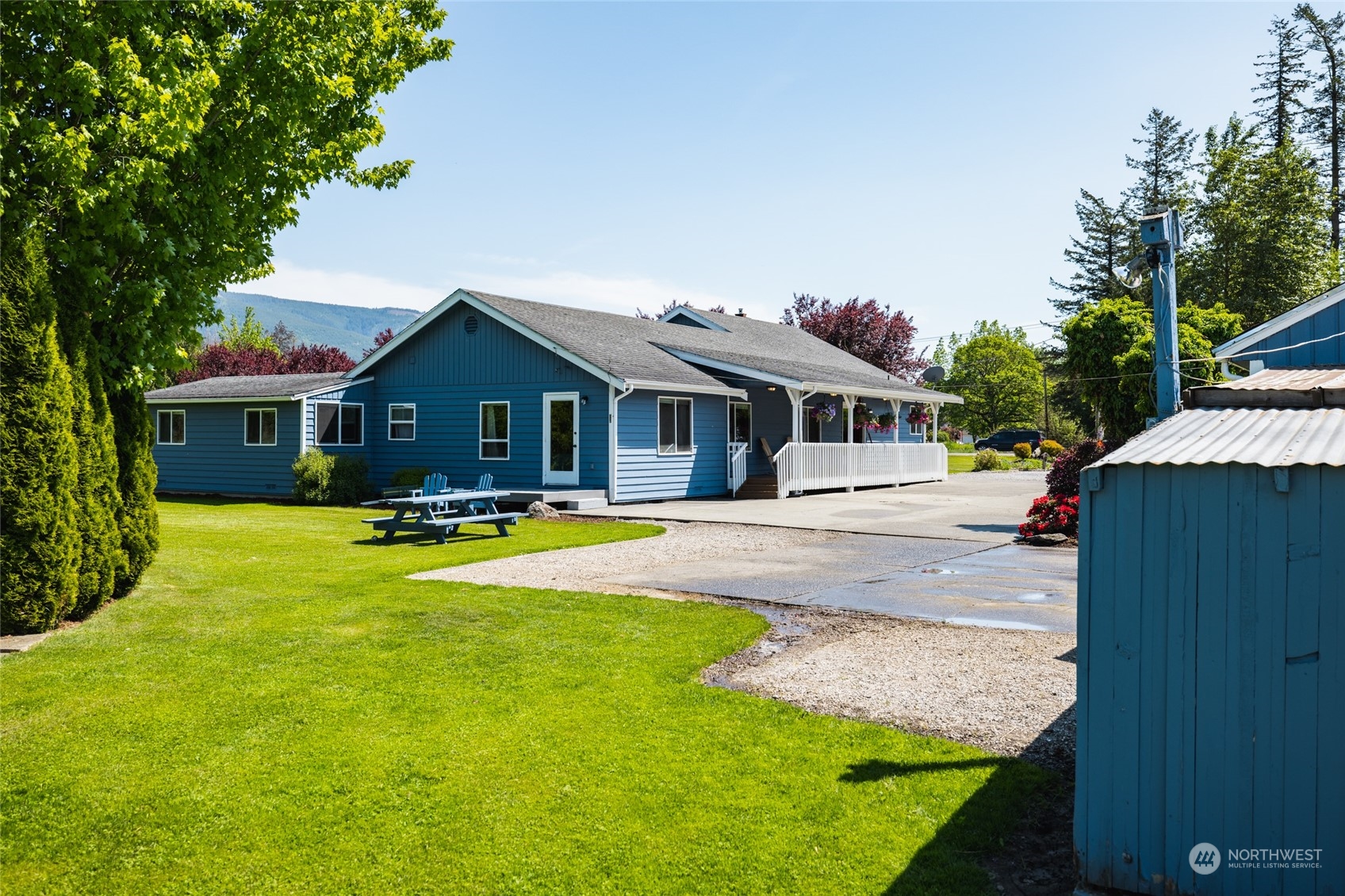 3304 South Pass Road Everson, WA 98247 - Photo 29 of 40 a front view of house with yard and swimming pool