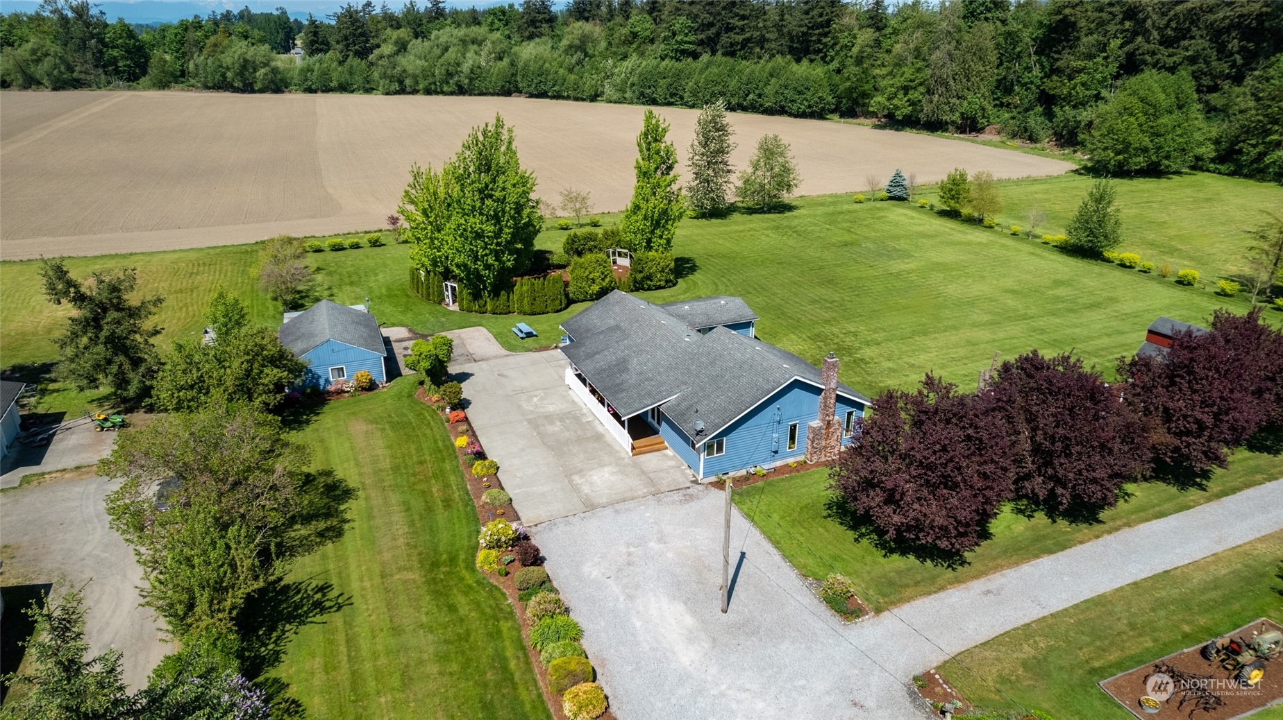 3304 South Pass Road Everson, WA 98247 - Photo 32 of 40 an aerial view of a house with a yard