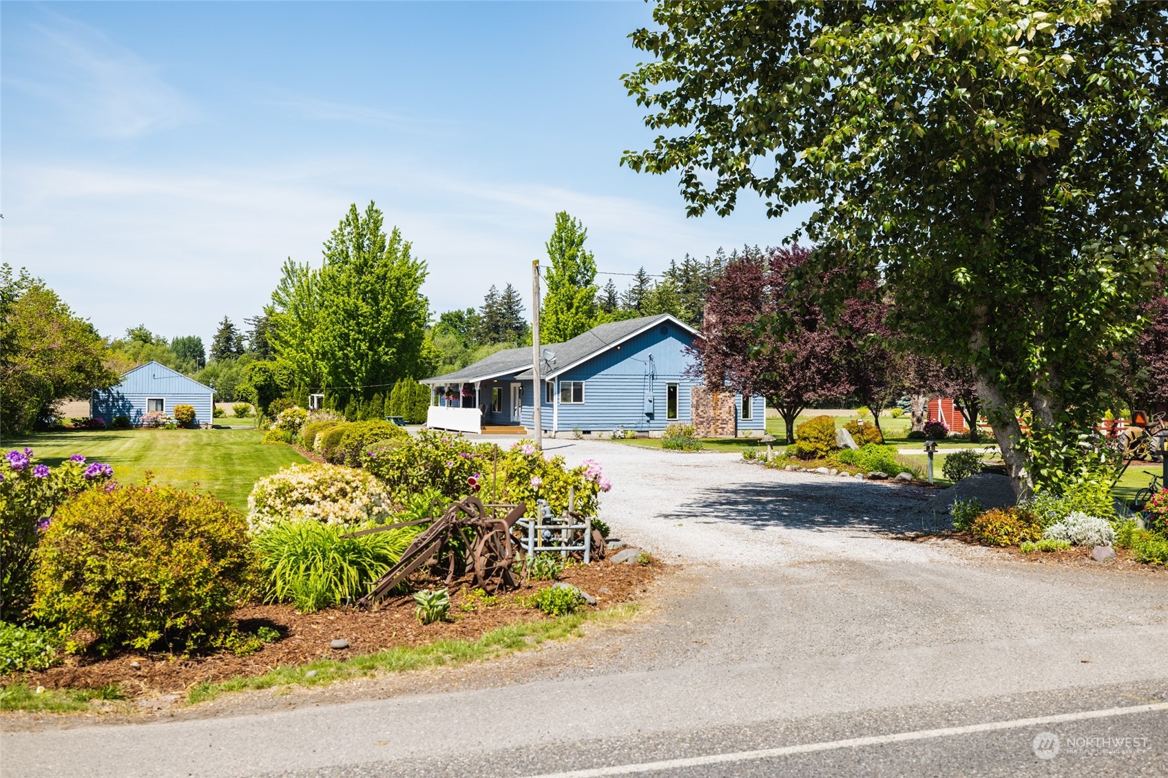 3304 South Pass Road Everson, WA 98247 - Photo 33 of 40 a view of a house with swimming pool and sitting area