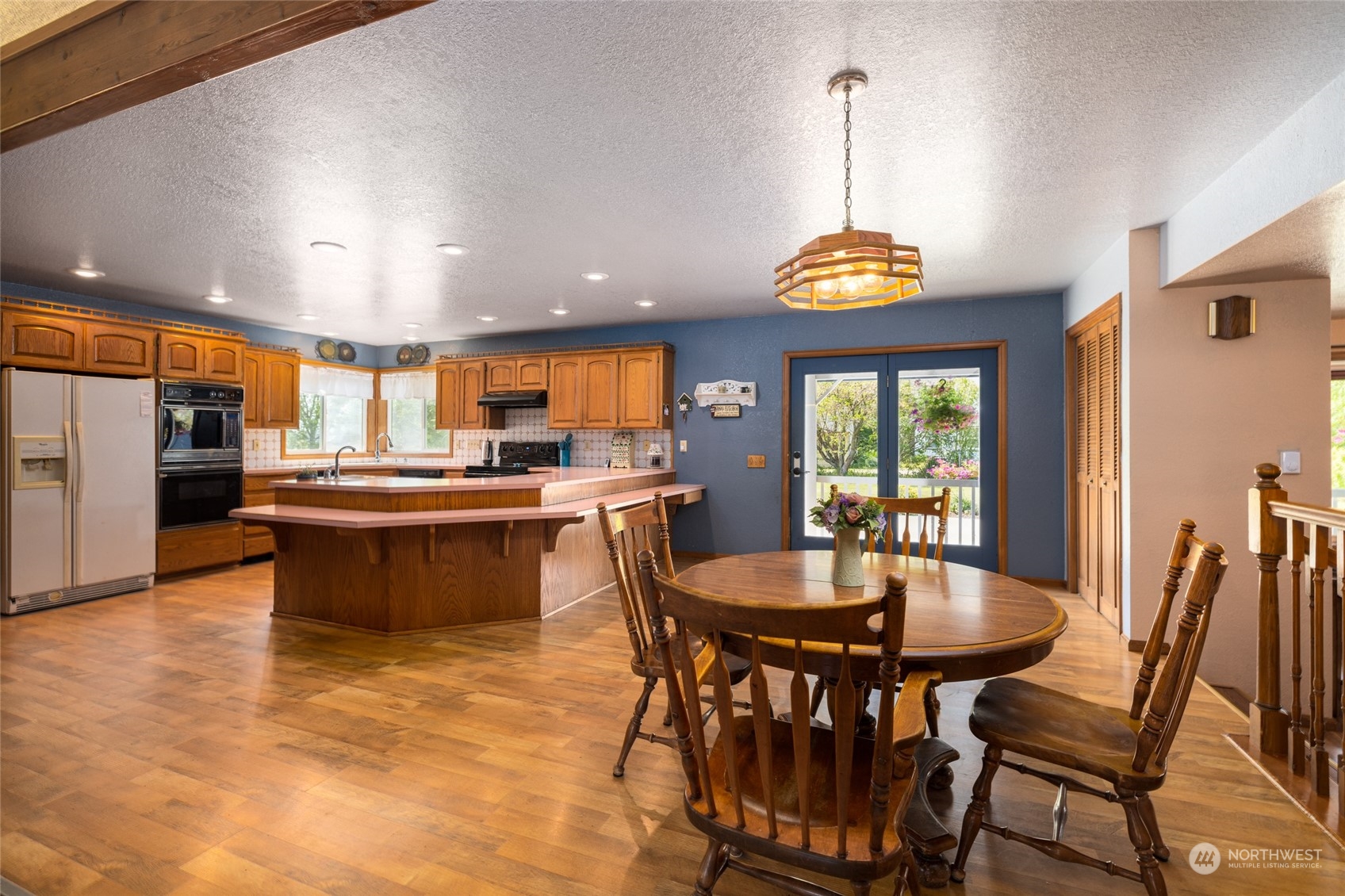 3304 South Pass Road Everson, WA 98247 - Photo 5 of 40 a view of a dining room with furniture window and wooden floor