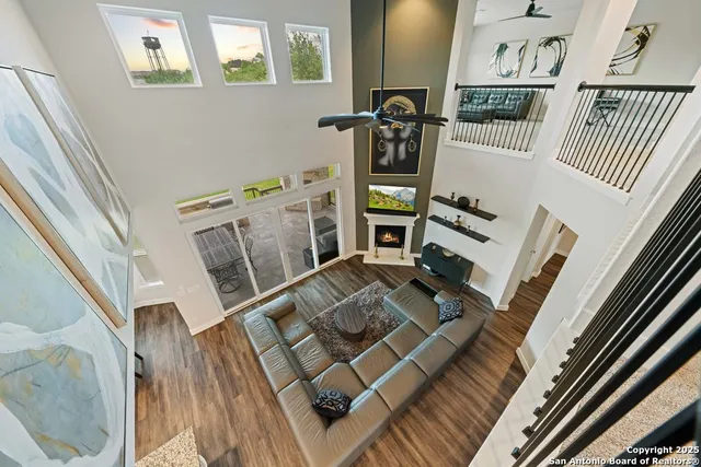a view of living room and wooden floor