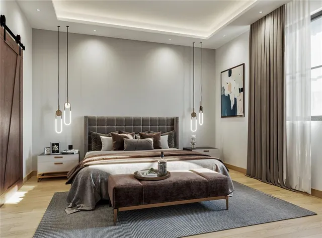 a bedroom with a bed and a mirror