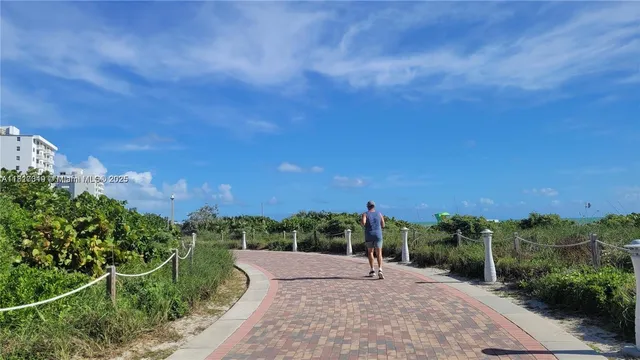 a view of a road with a yard