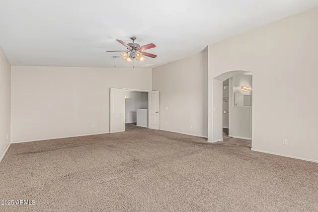a white bath tub sitting next to a window