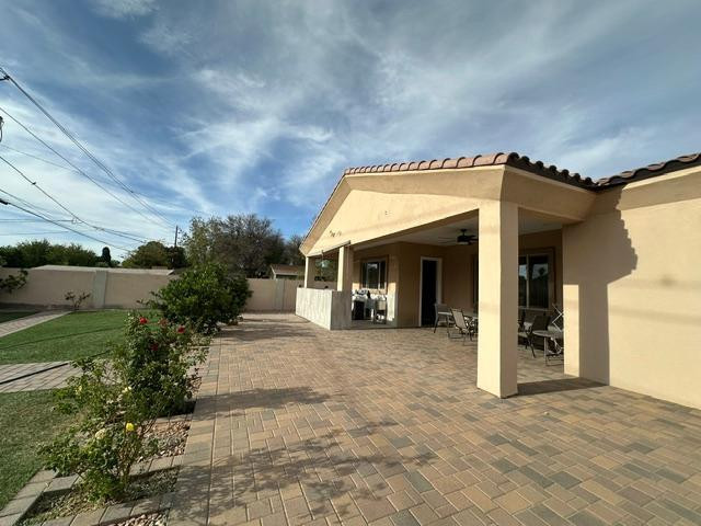 6830 North 14th Street Phoenix, AZ 85014 - Photo 11 of 28 a view of a house with a porch