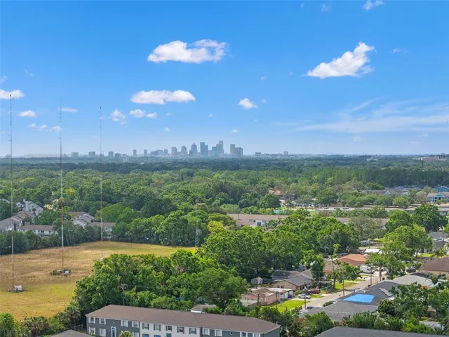 a view of a city with lots of green space