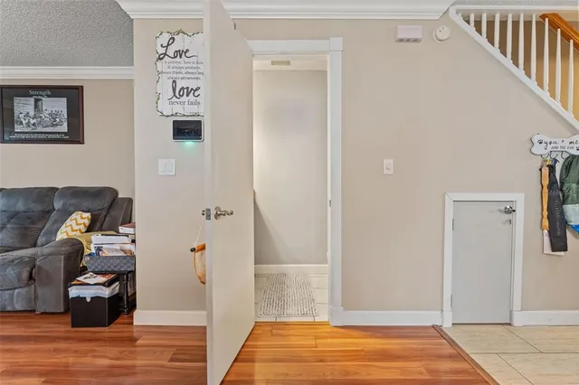 a view of livingroom with furniture and workspace