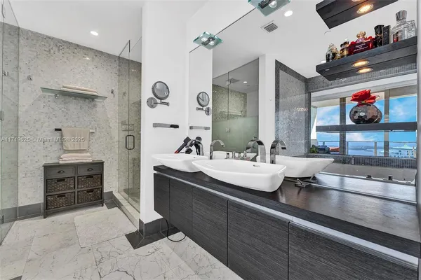 a bedroom with a bed and a table