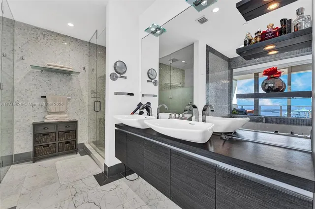 a bedroom with a bed and a table