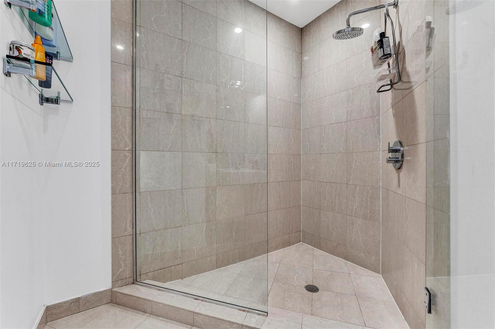 200 Biscayne Blvd Way, Unit 5001 Miami, FL 33131 - Photo 21 of 48 a bathroom with a shower