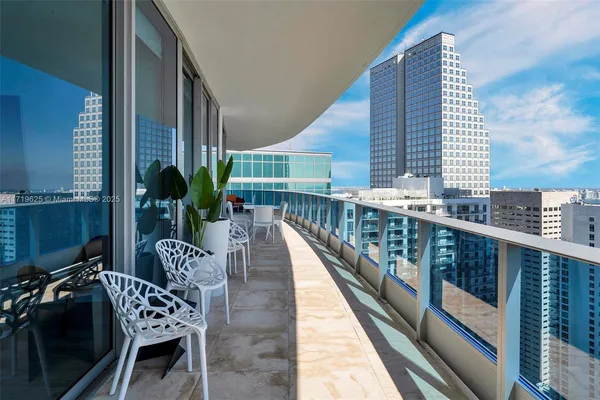 a view of a city with tall buildings