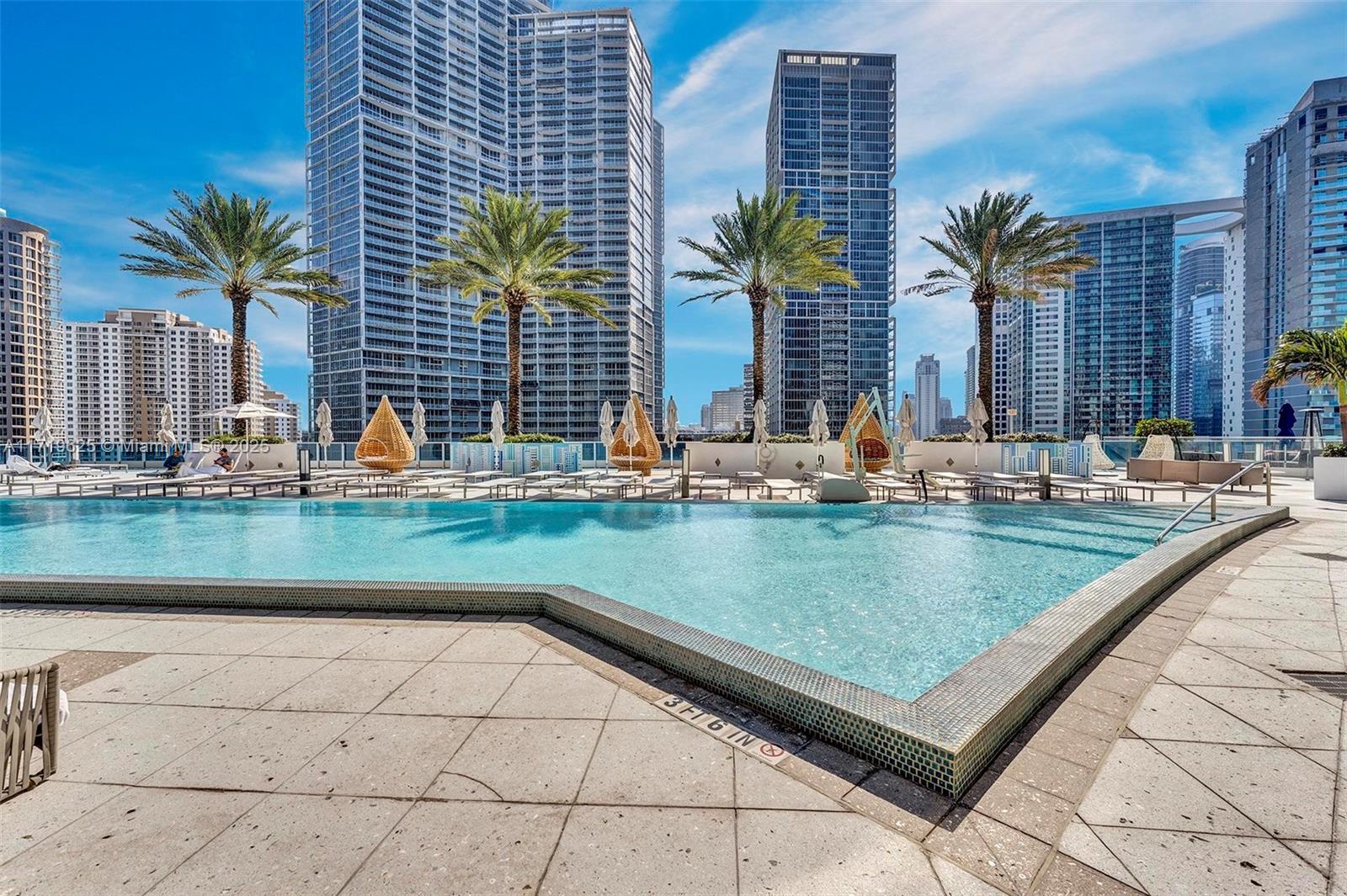 200 Biscayne Blvd Way, Unit 5001 Miami, FL 33131 - Photo 43 of 48 a view of outdoor space with swimming pool and seating