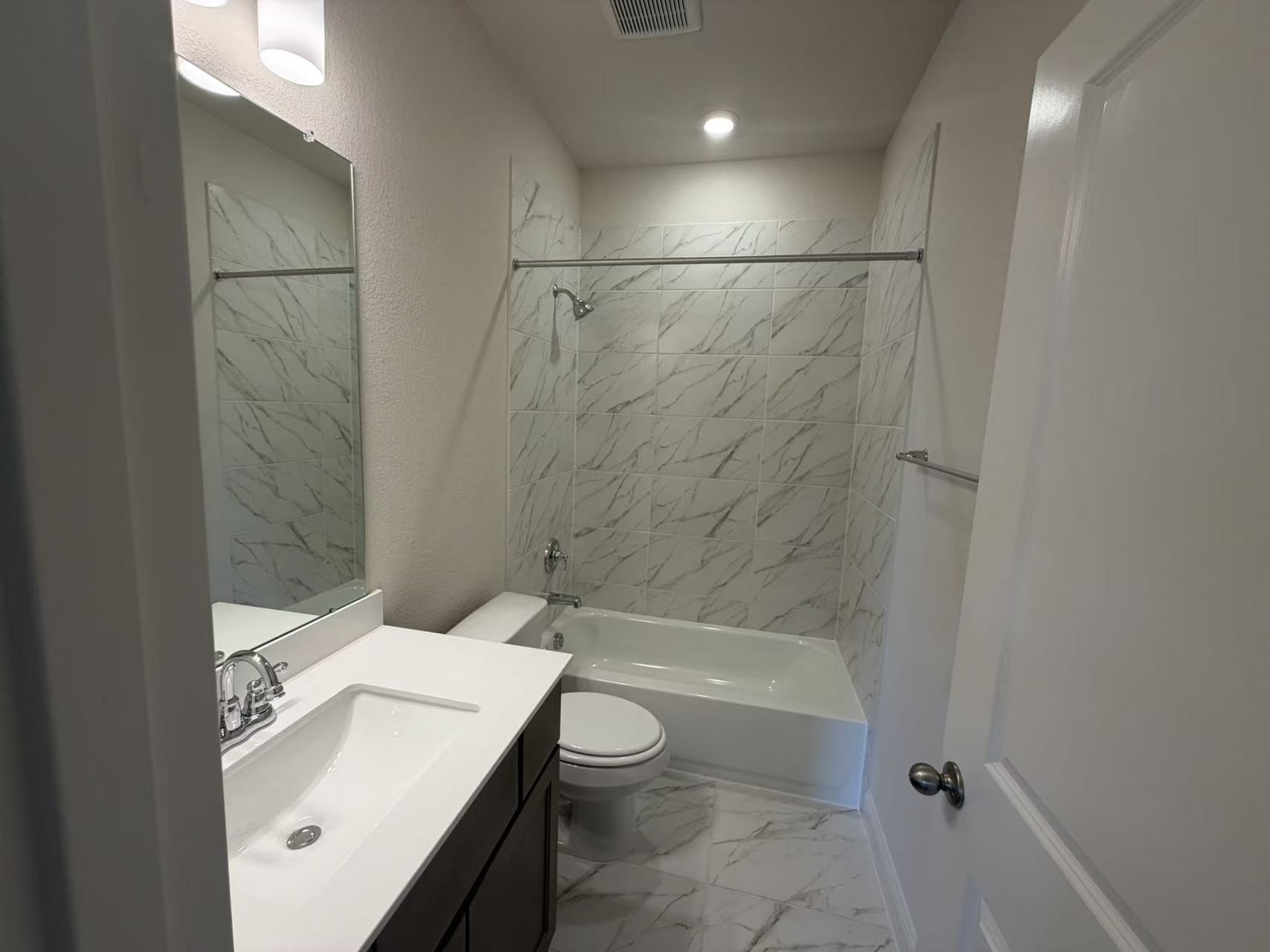 4014 Colony Lane Missouri City, TX 77459 - Photo 13 of 40 a bathroom with a sink a toilet and shower