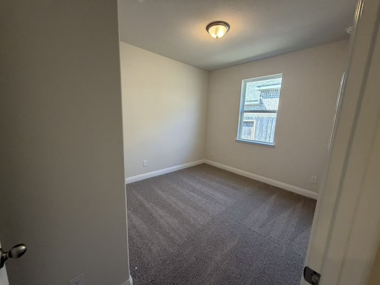 4014 Colony Lane Missouri City, TX 77459 - Photo 23 of 40 an empty room with a window