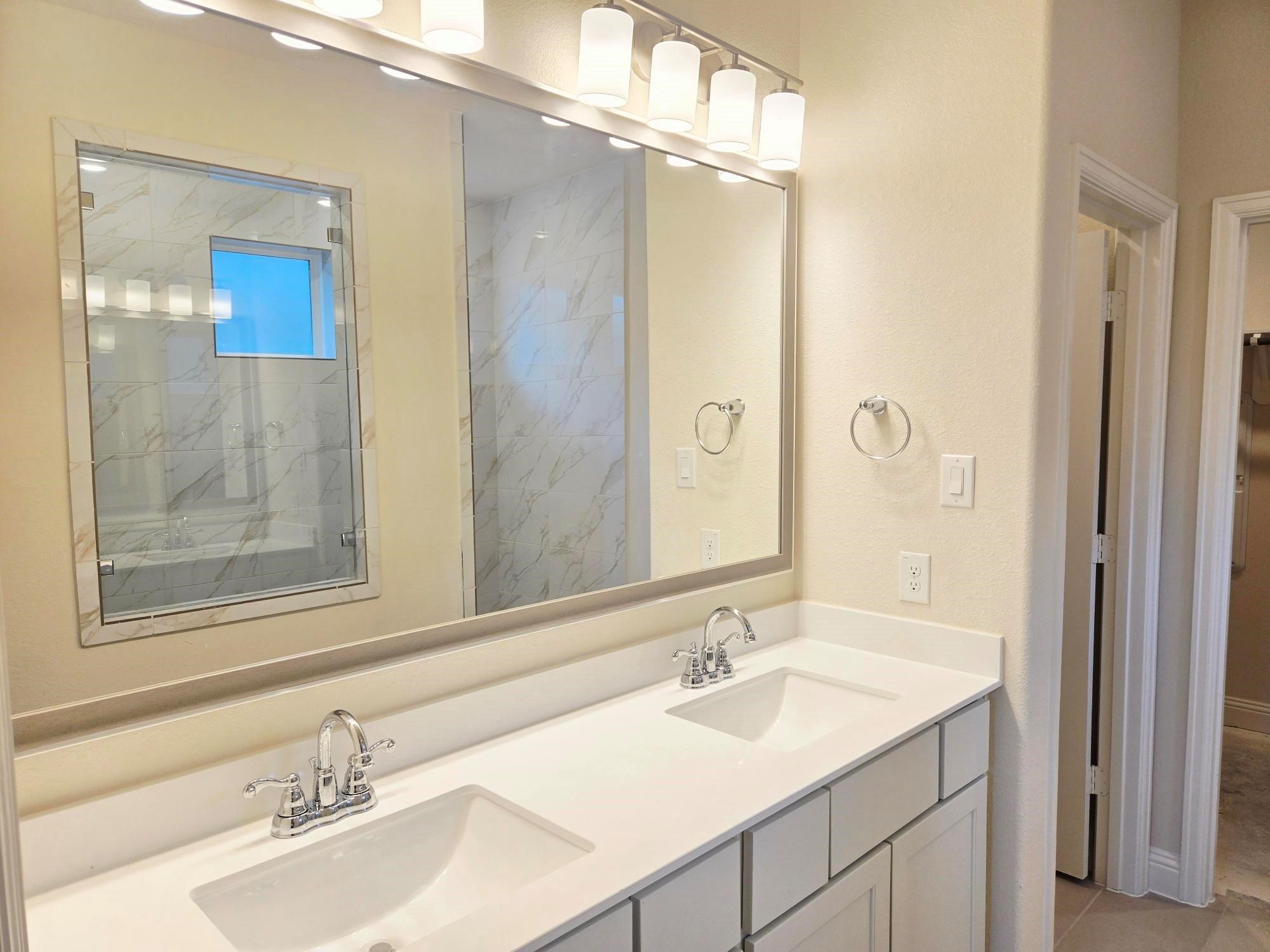 4014 Colony Lane Missouri City, TX 77459 - Photo 24 of 40 a bathroom with a sink and a mirror