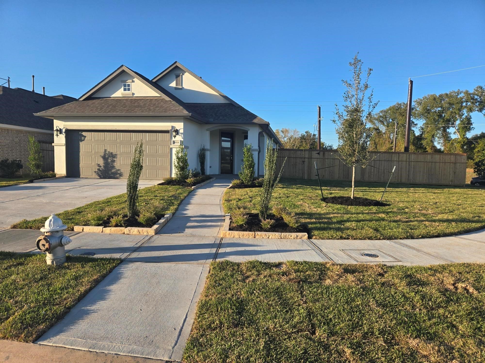 4014 Colony Lane Missouri City, TX 77459 - Photo 35 of 40 a front view of a house with a yard