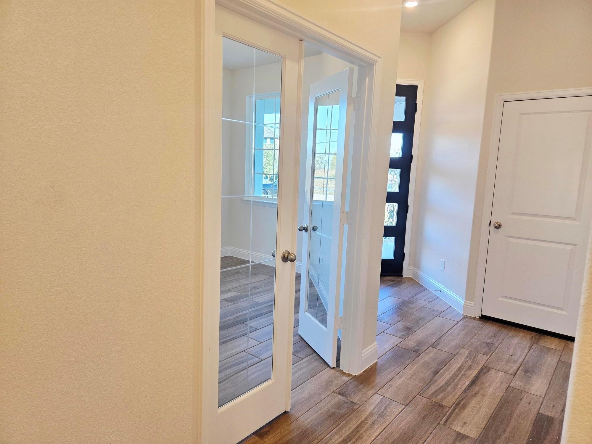 4014 Colony Lane Missouri City, TX 77459 - Photo 9 of 40 wooden floor with white walls