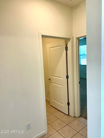 a view of a hallway with closet