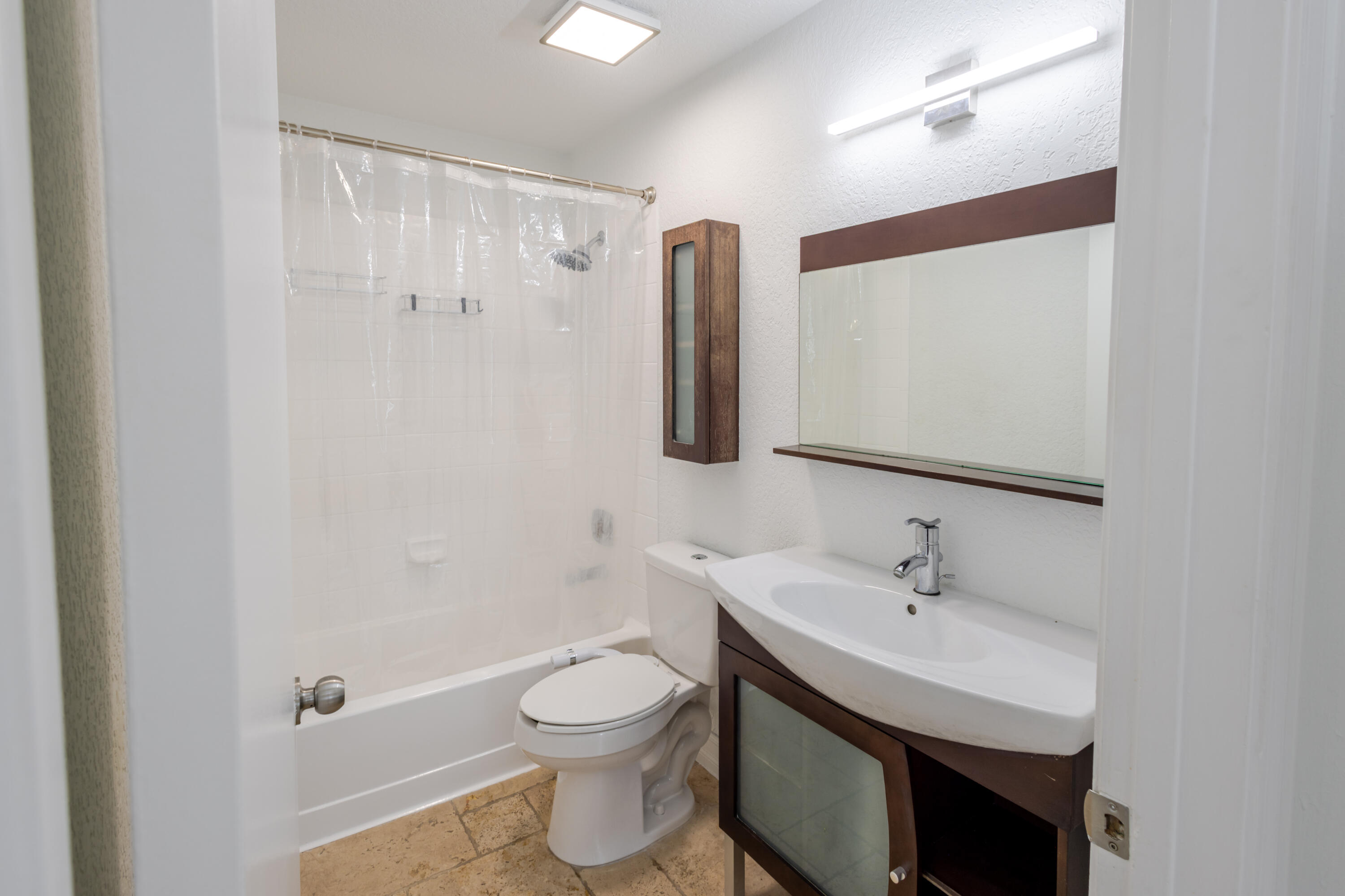 23157 Bentley Place Boca Raton, FL 33433 - Photo 11 of 17 a bathroom with a sink toilet and shower