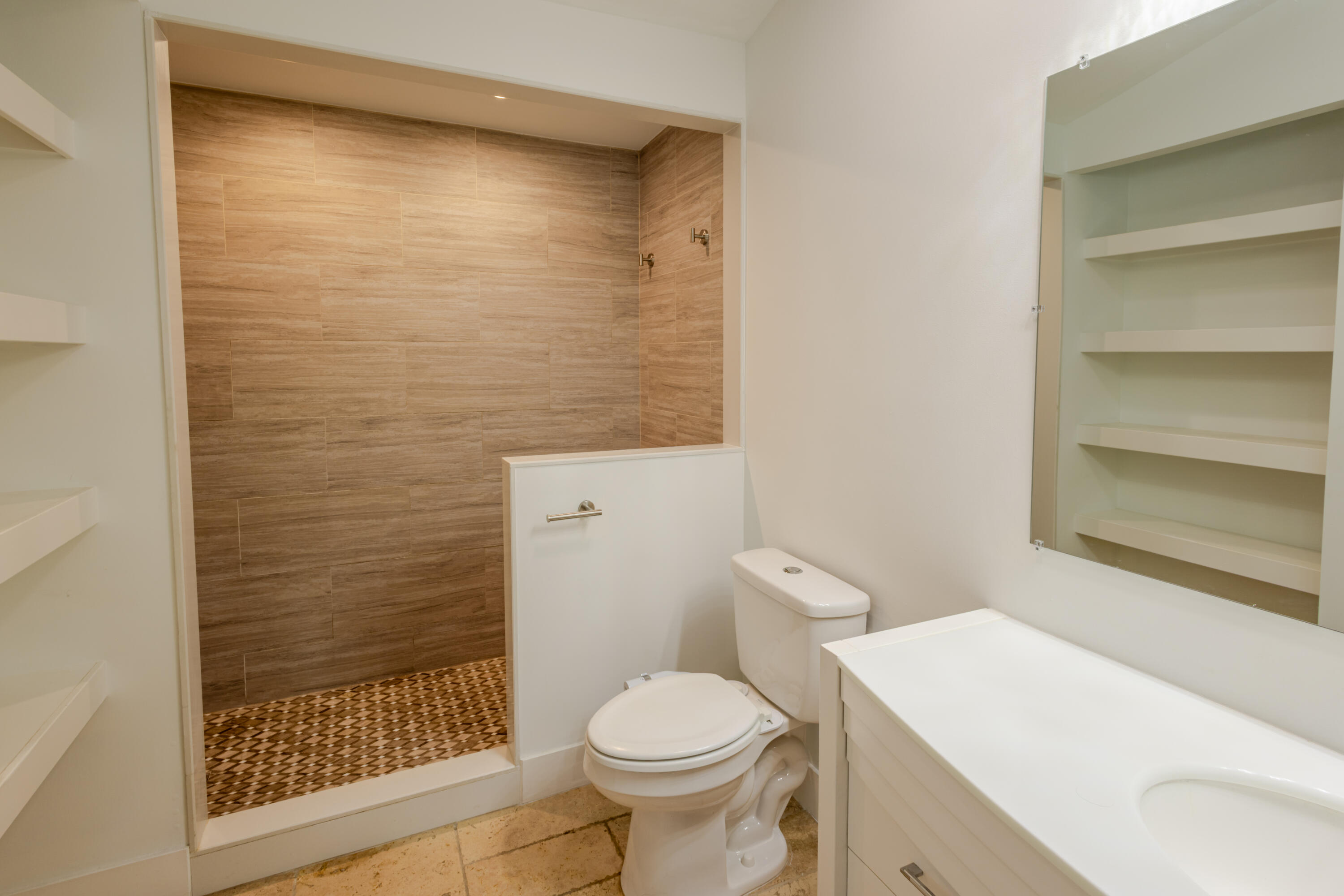 23157 Bentley Place Boca Raton, FL 33433 - Photo 13 of 17 a bathroom with a toilet and a shower