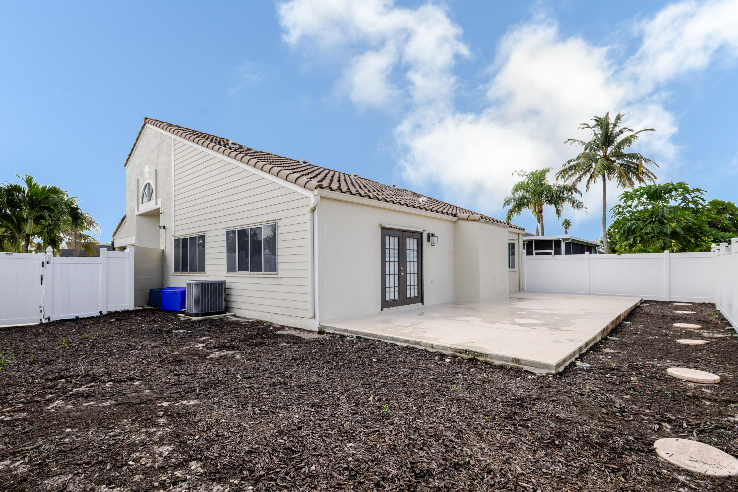 23157 Bentley Place Boca Raton, FL 33433 - Photo 17 of 17 a front view of a house with a yard