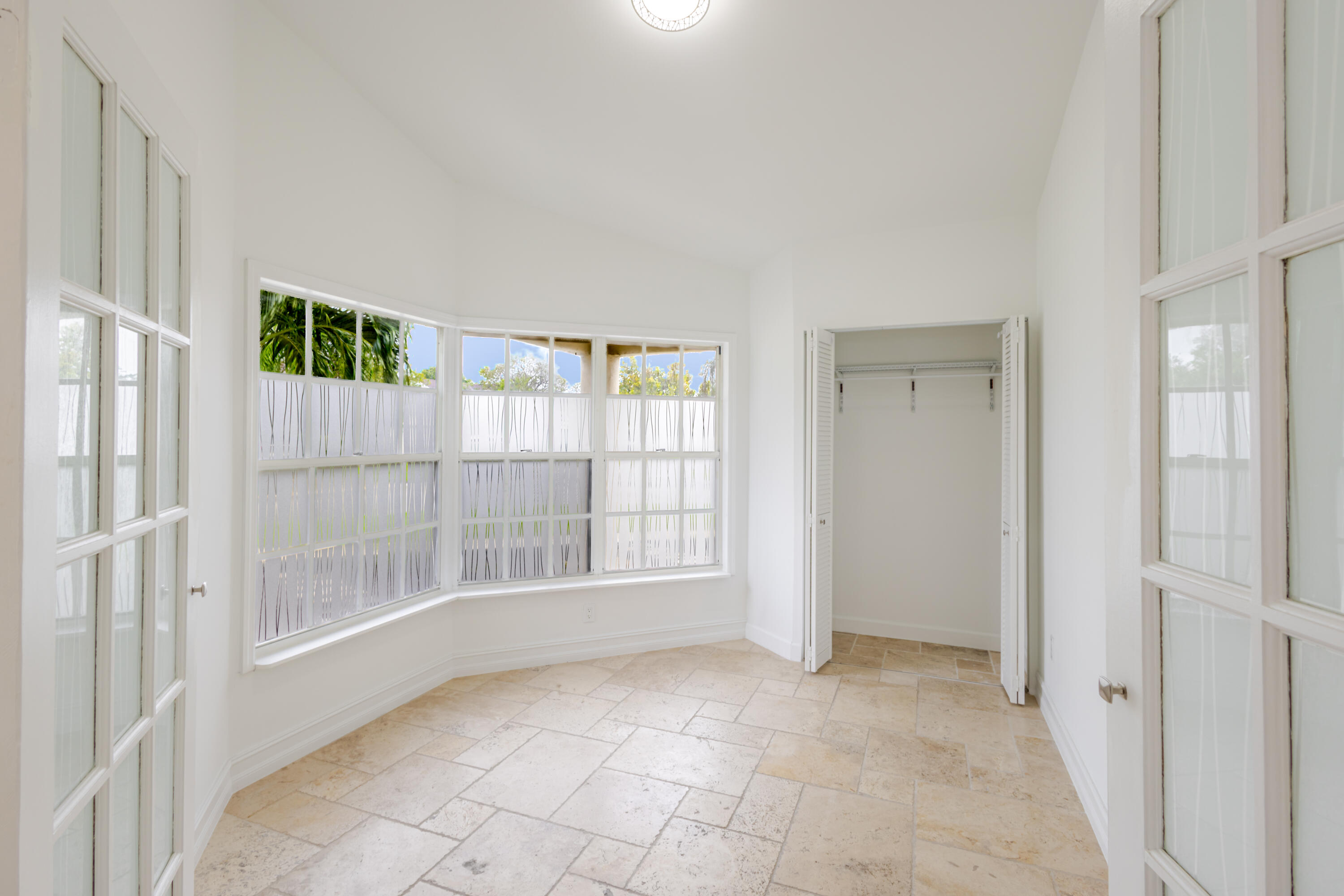 23157 Bentley Place Boca Raton, FL 33433 - Photo 5 of 17 a view of an empty room with a window