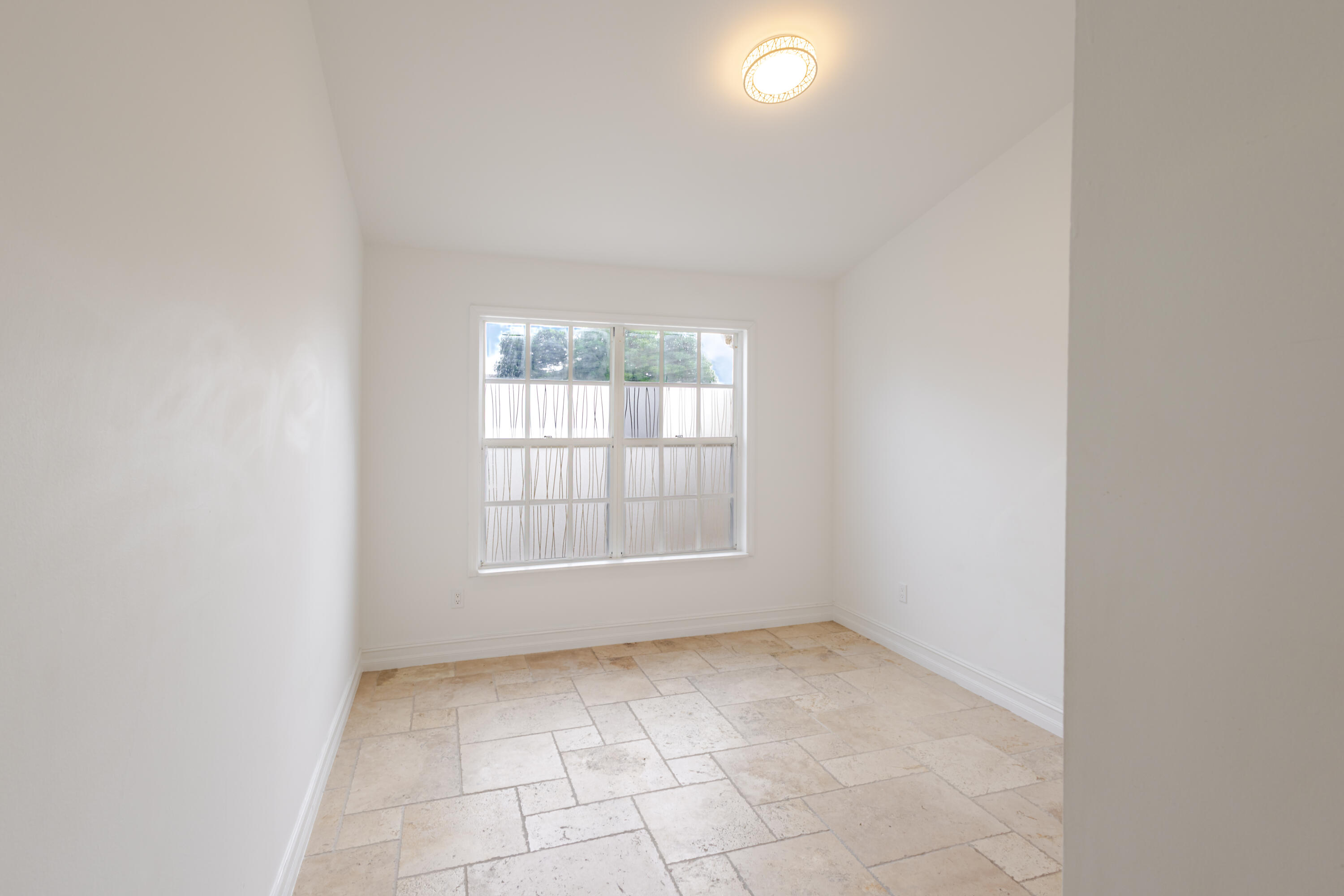 23157 Bentley Place Boca Raton, FL 33433 - Photo 6 of 17 an empty room with windows