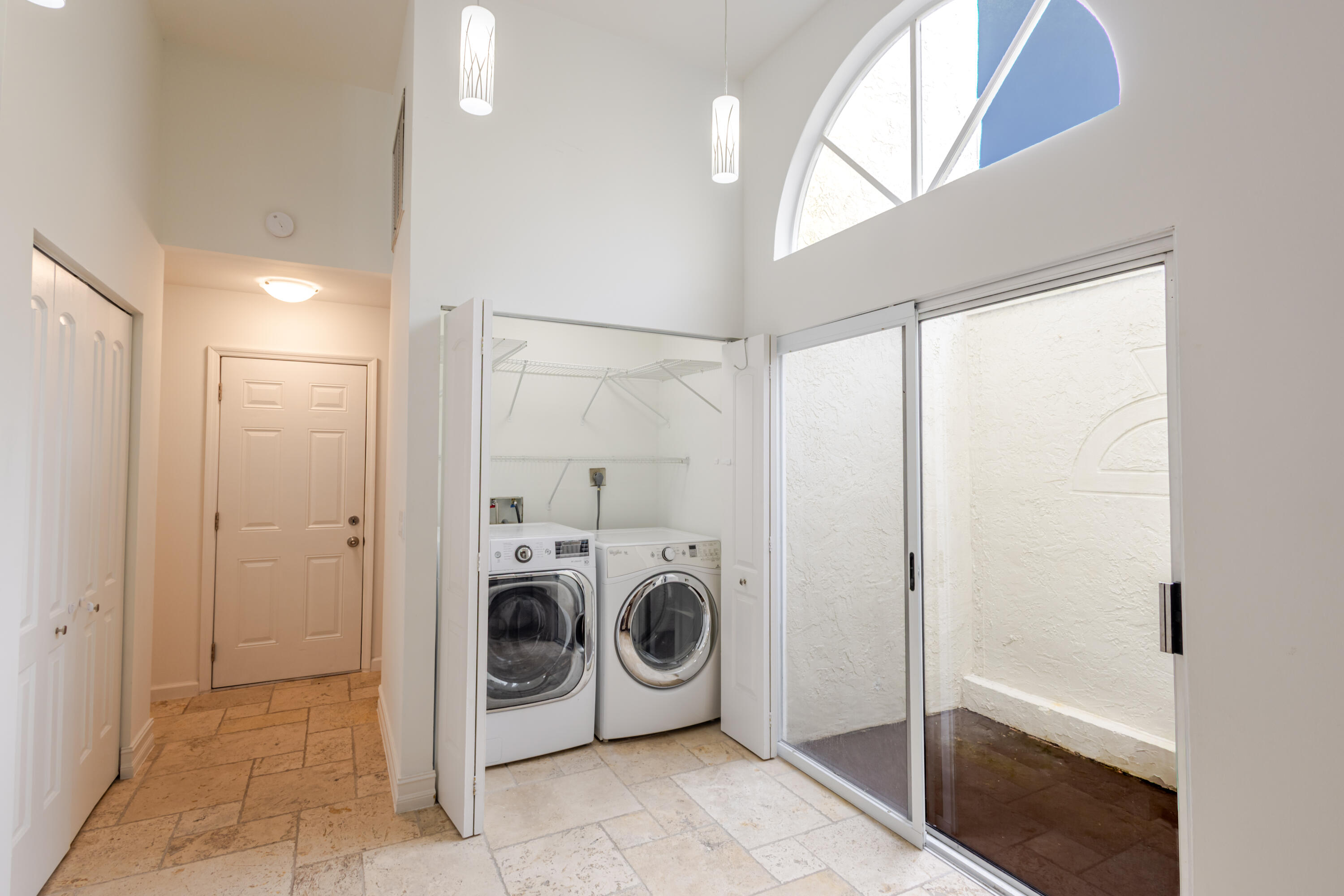 23157 Bentley Place Boca Raton, FL 33433 - Photo 8 of 17 a utility room with dryer and washer