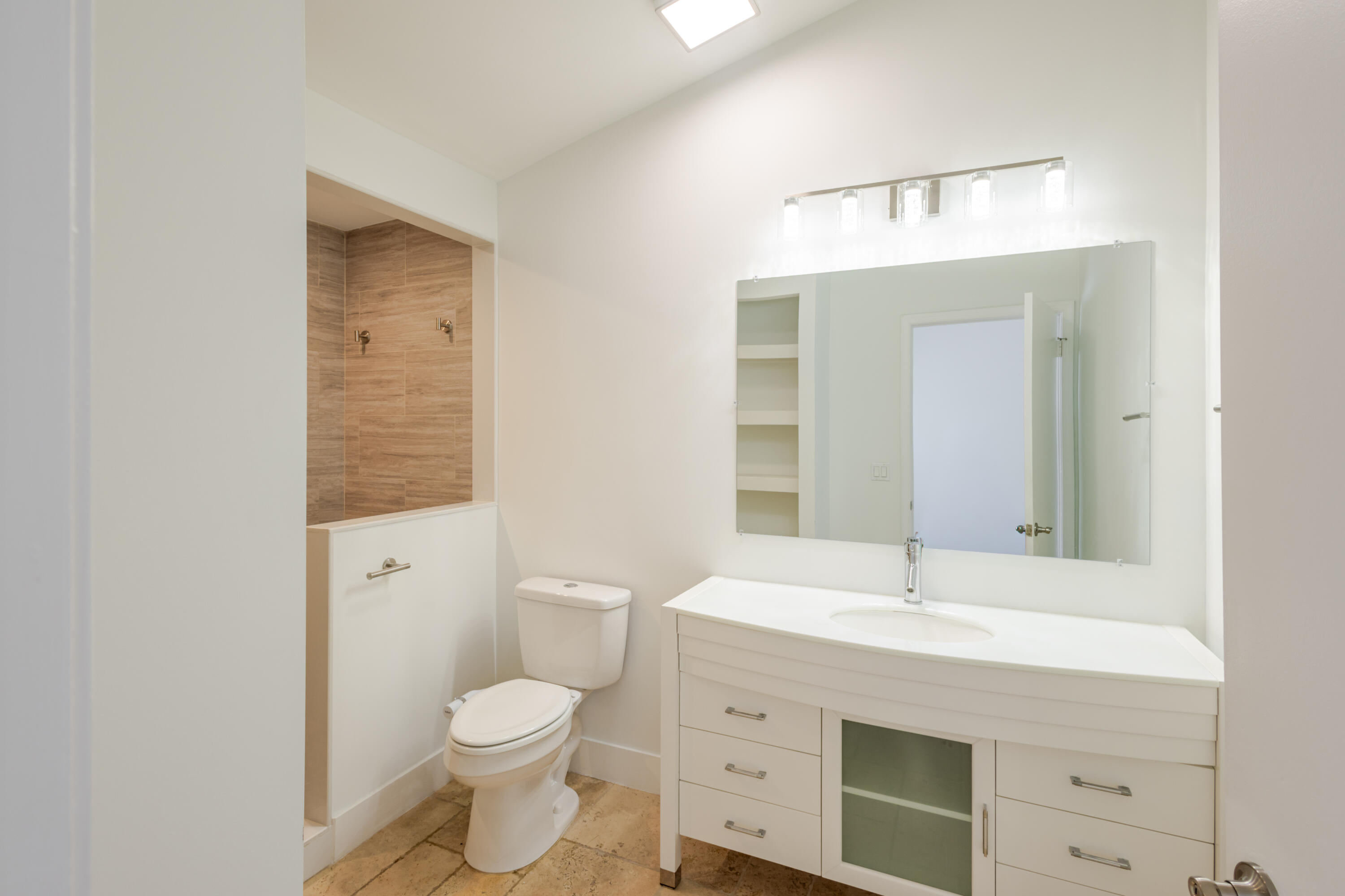 23157 Bentley Place Boca Raton, FL 33433 - Photo 10 of 17 a bathroom with a sink a toilet and shower