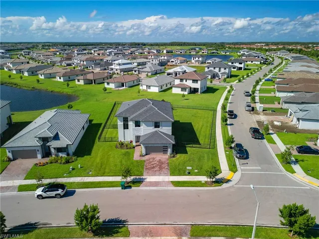 an aerial view of a house with a garden