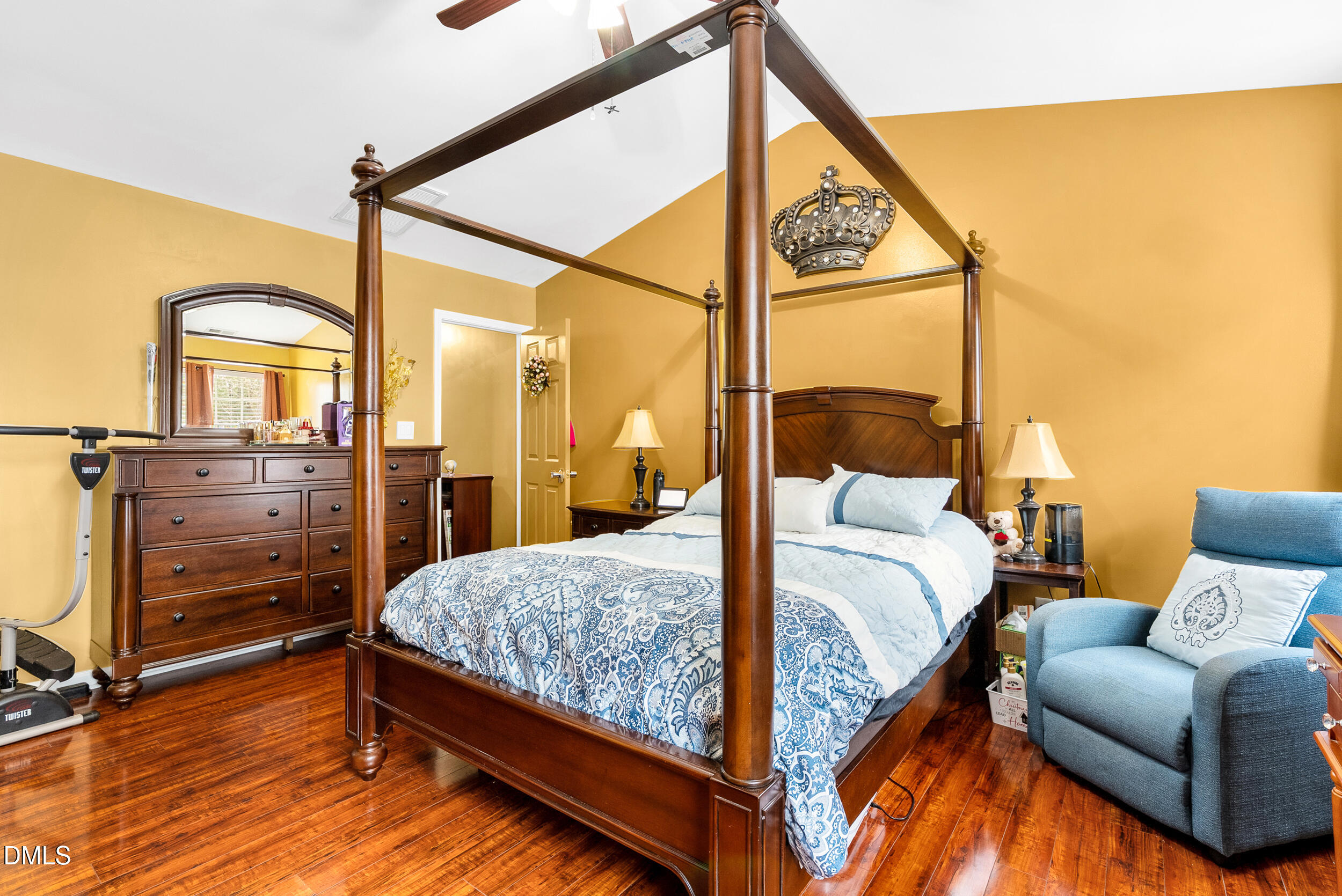 8840 Thornton Town Place Raleigh, NC 27616 - Photo 14 of 24 a bedroom with a bed window and a mirror