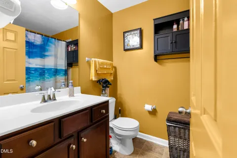 a bedroom with a bed and furniture