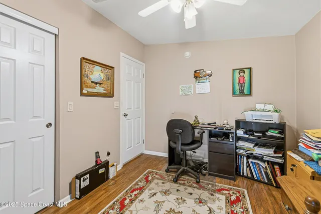 a view of a workspace with furniture and workspace