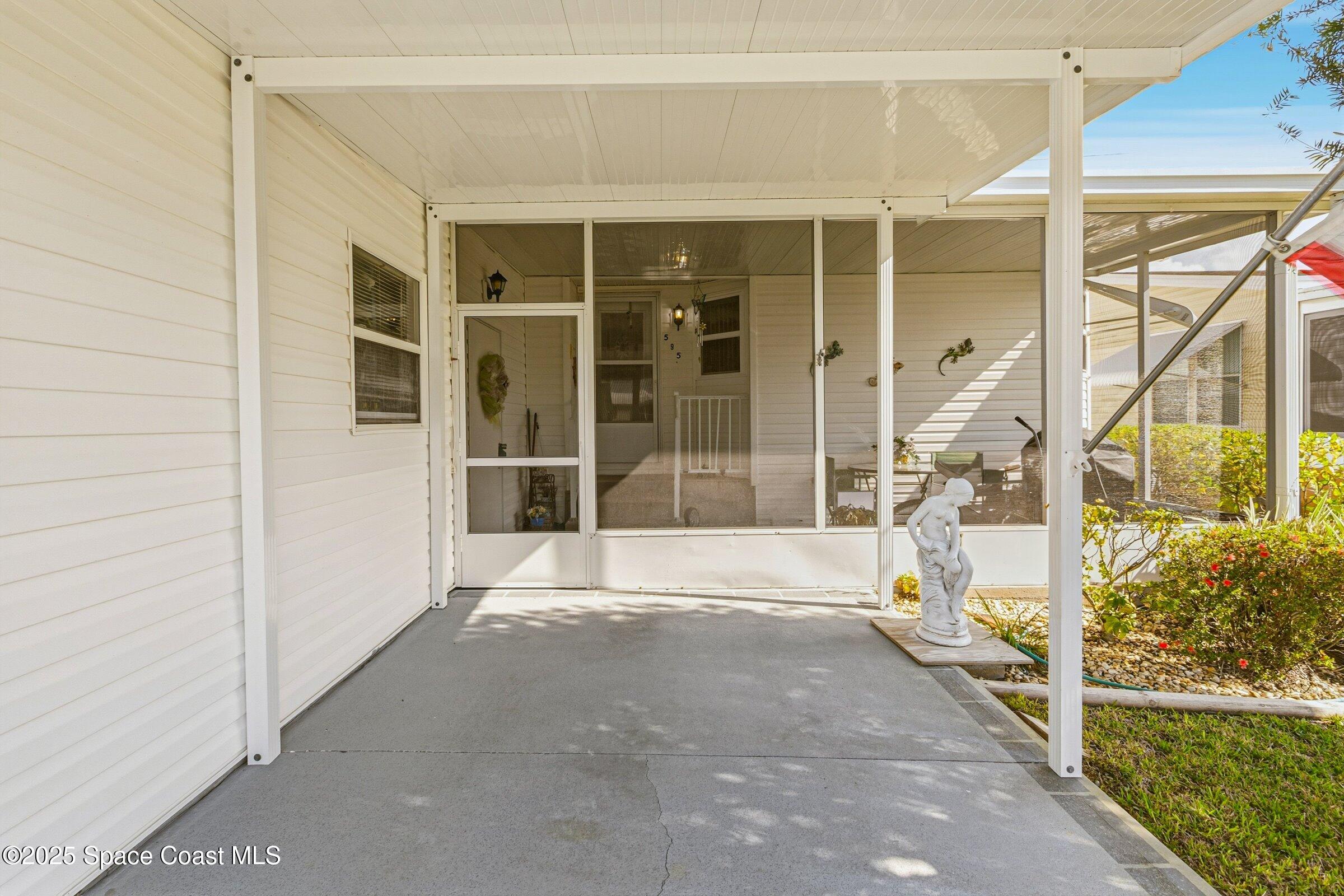 595 Outer Drive, Unit 129 Cocoa, FL 32926 - Photo 24 of 49 a view of front door of a house