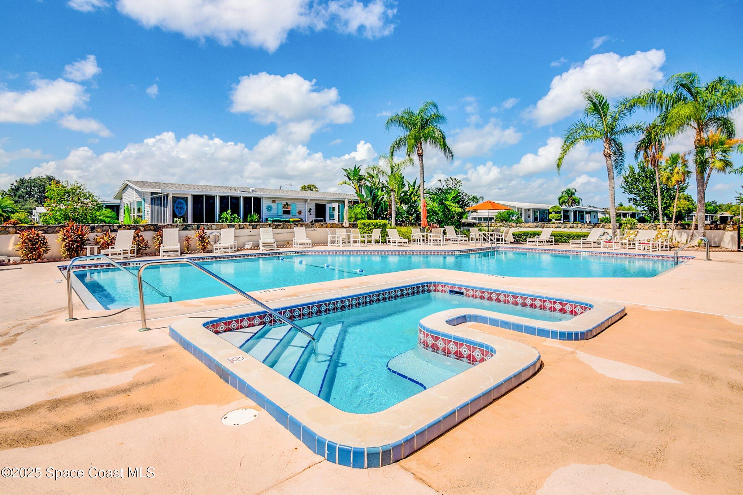 595 Outer Drive, Unit 129 Cocoa, FL 32926 - Photo 27 of 49 a view of swimming pool with outdoor seating