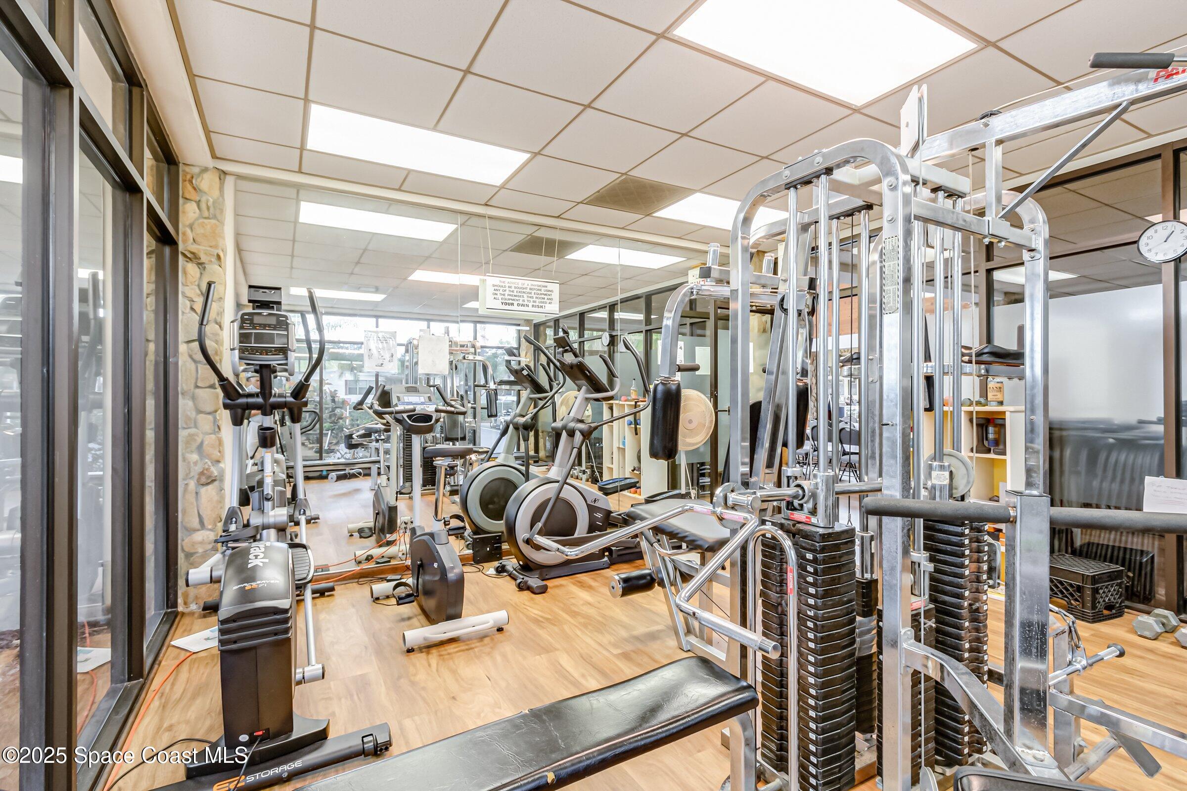 595 Outer Drive, Unit 129 Cocoa, FL 32926 - Photo 40 of 49 a view of a room with gym equipment