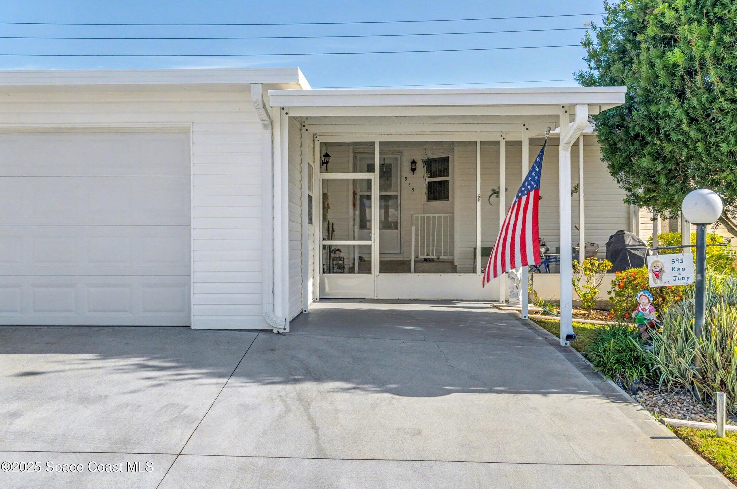 595 Outer Drive, Unit 129 Cocoa, FL 32926 - Photo 4 of 49 a view of entryway of the house