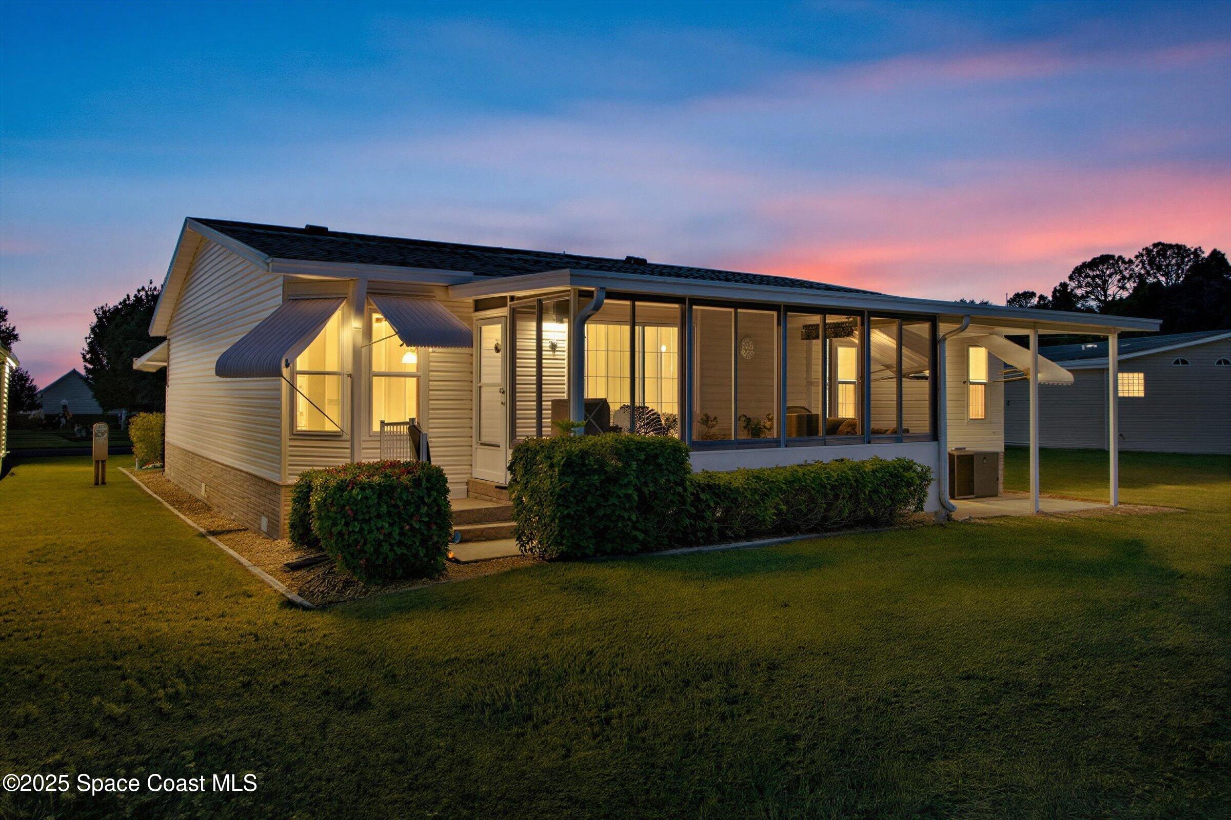 595 Outer Drive, Unit 129 Cocoa, FL 32926 - Photo 6 of 49 a view of swimming pool from a big yard