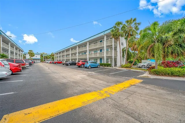 a view of street with parked cars