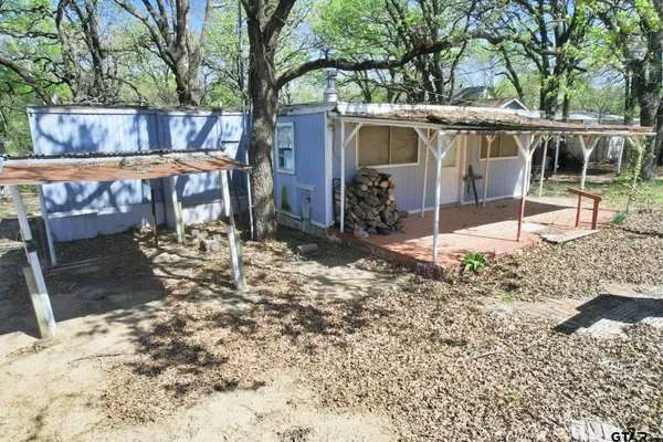 a view of a porch with a yard