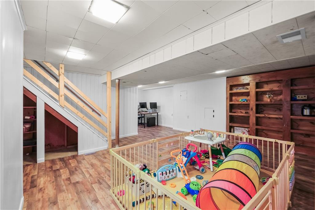 1654 Hollyrood Road Pittsburgh, PA 15227 - Photo 28 of 33 a bedroom with furniture and staircase