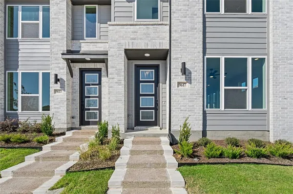 a front view of a house having yard