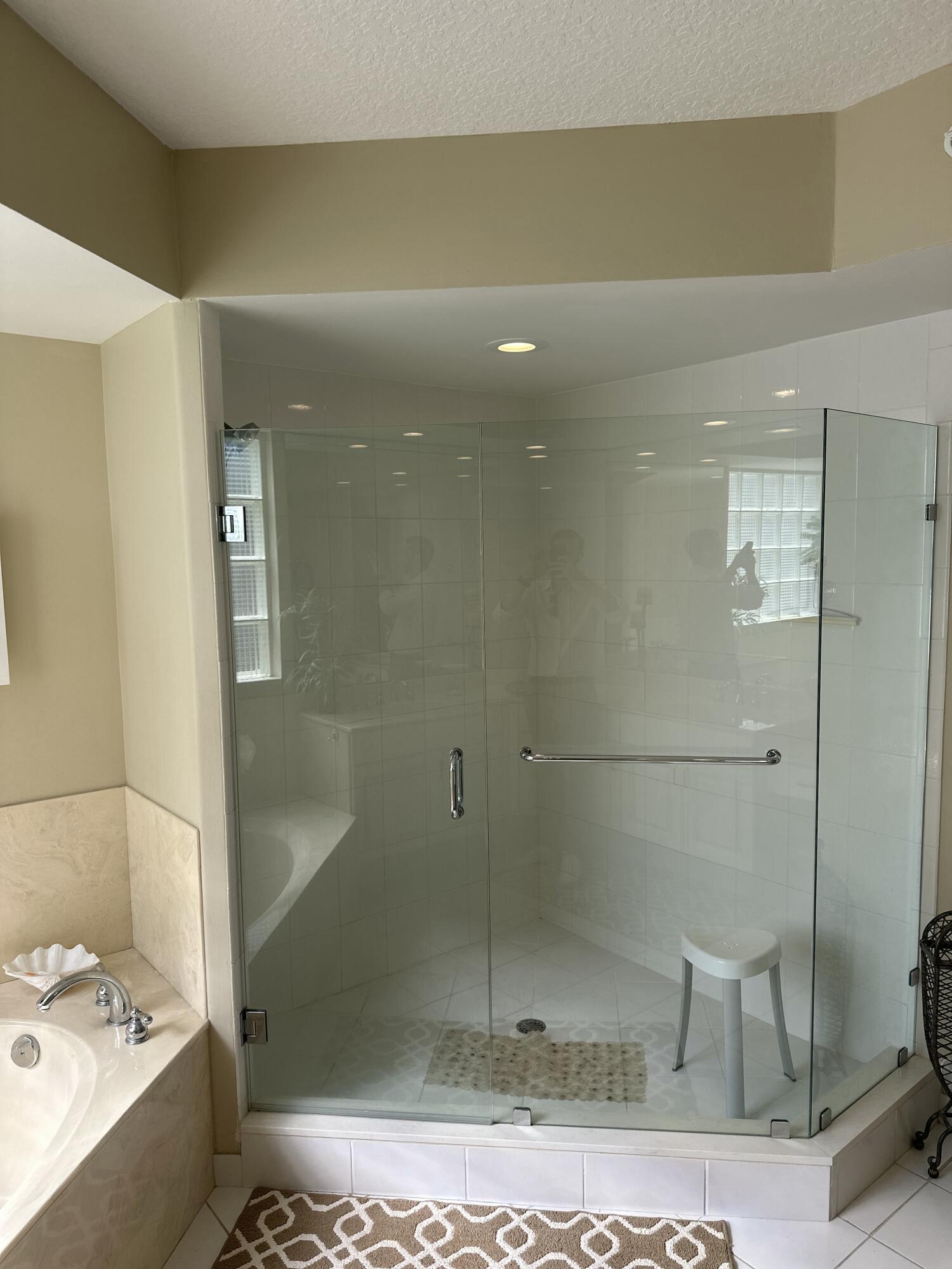 2900 North Hwy A1A, Unit 2 Fort Pierce, FL 34949 - Photo 12 of 34 a bathroom with a shower