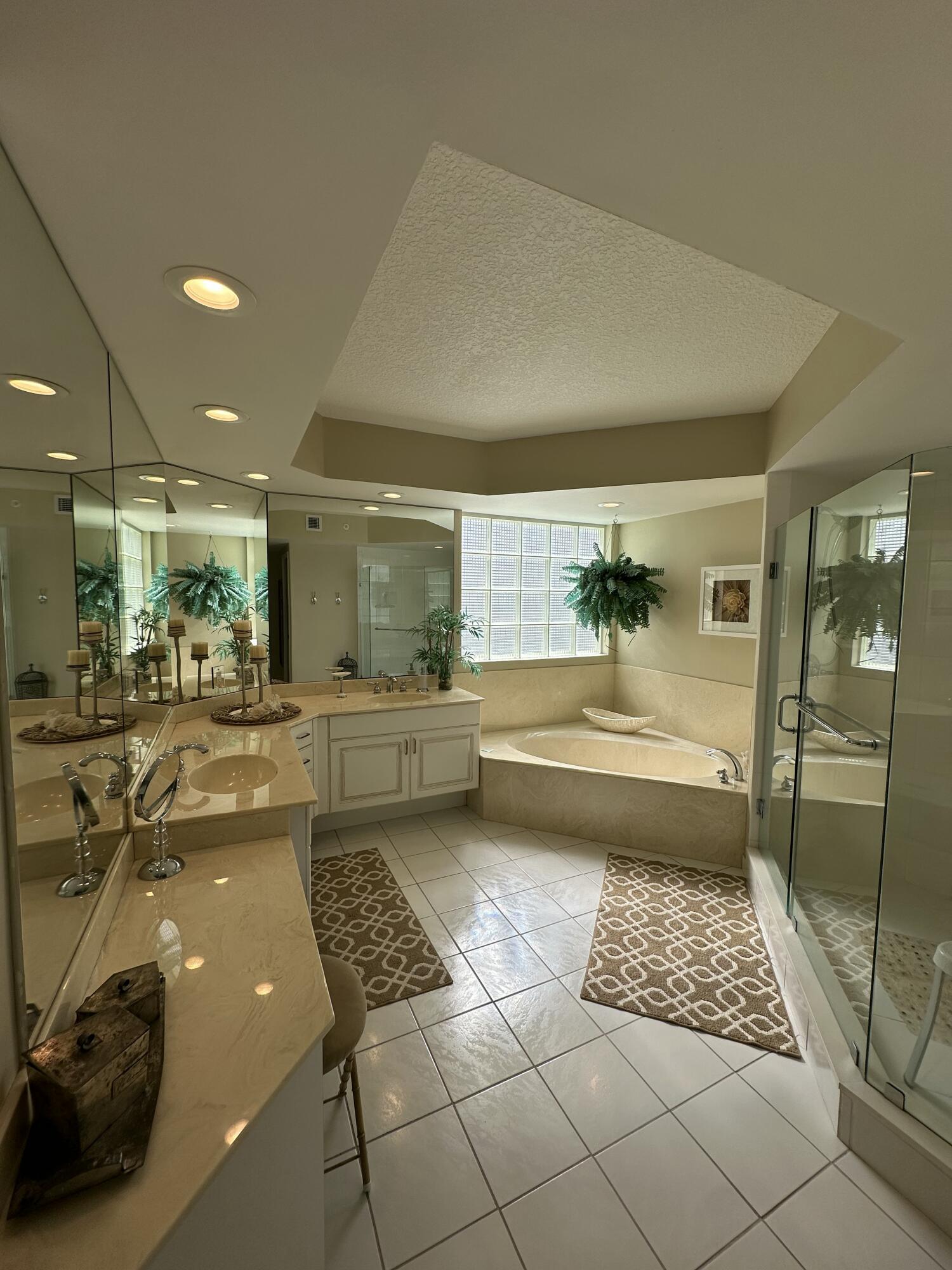 2900 North Hwy A1A, Unit 2 Fort Pierce, FL 34949 - Photo 14 of 34 a bathroom with a bathtub and a shower