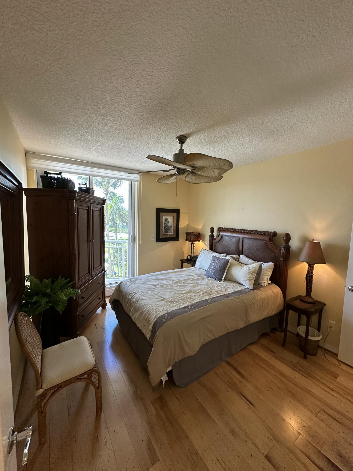 2900 North Hwy A1A, Unit 2 Fort Pierce, FL 34949 - Photo 17 of 34 a bedroom with bed and a couch