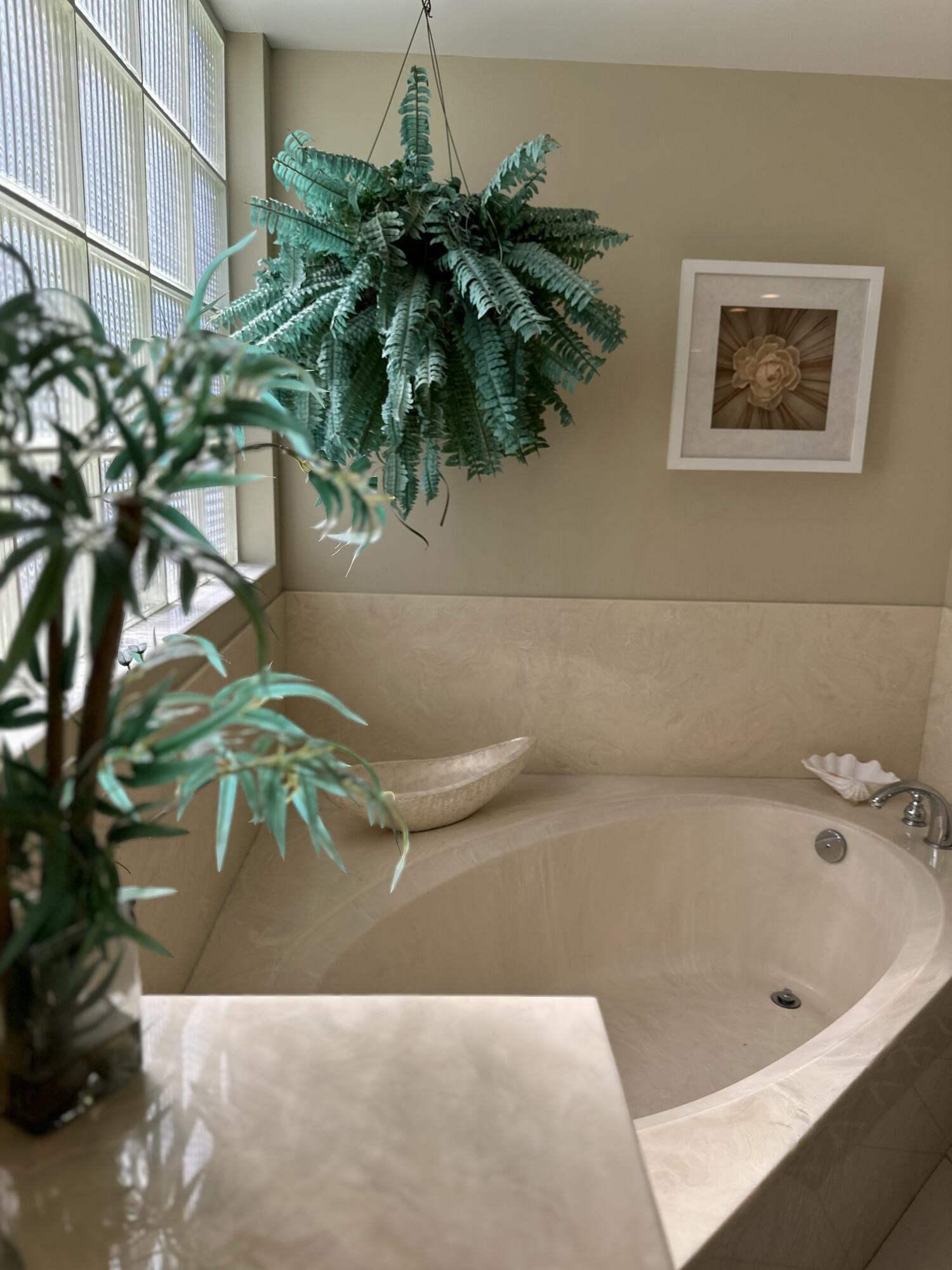 2900 North Hwy A1A, Unit 2 Fort Pierce, FL 34949 - Photo 27 of 34 a bath tub sitting in a bathroom