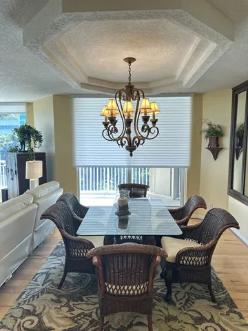 a view of a dining room with furniture
