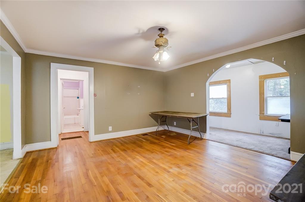 1429 Beth Haven Church Road Denver, NC 28037 - Photo 11 of 27 a view of livingroom with hardwood floor and a ceiling fan