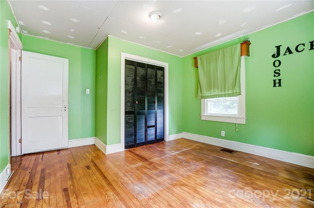 1429 Beth Haven Church Road Denver, NC 28037 - Photo 17 of 27 a bedroom with a bed and a window